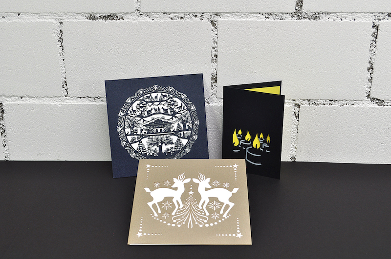 Diverse Karten mit Laserstanzungen